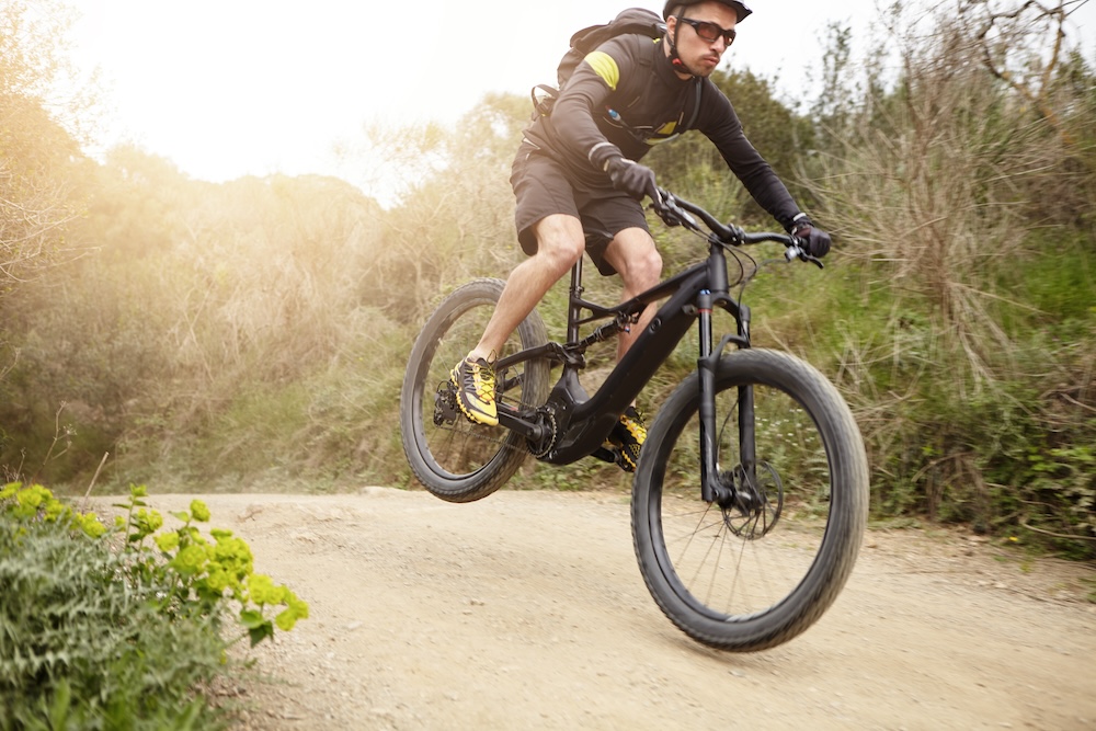 a man riding an e-bike