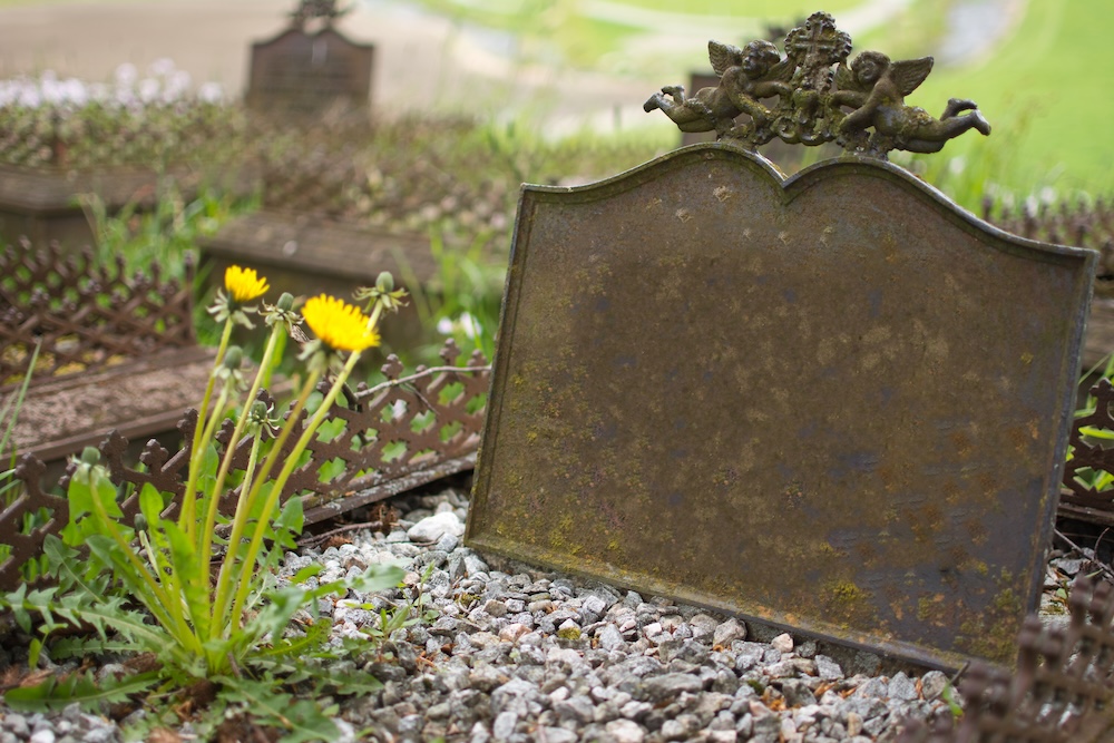 a headstone at a cemetery